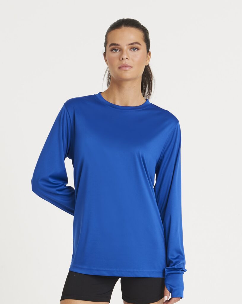 Model wearing a royal blue long-sleeve performance t-shirt paired with black shorts.