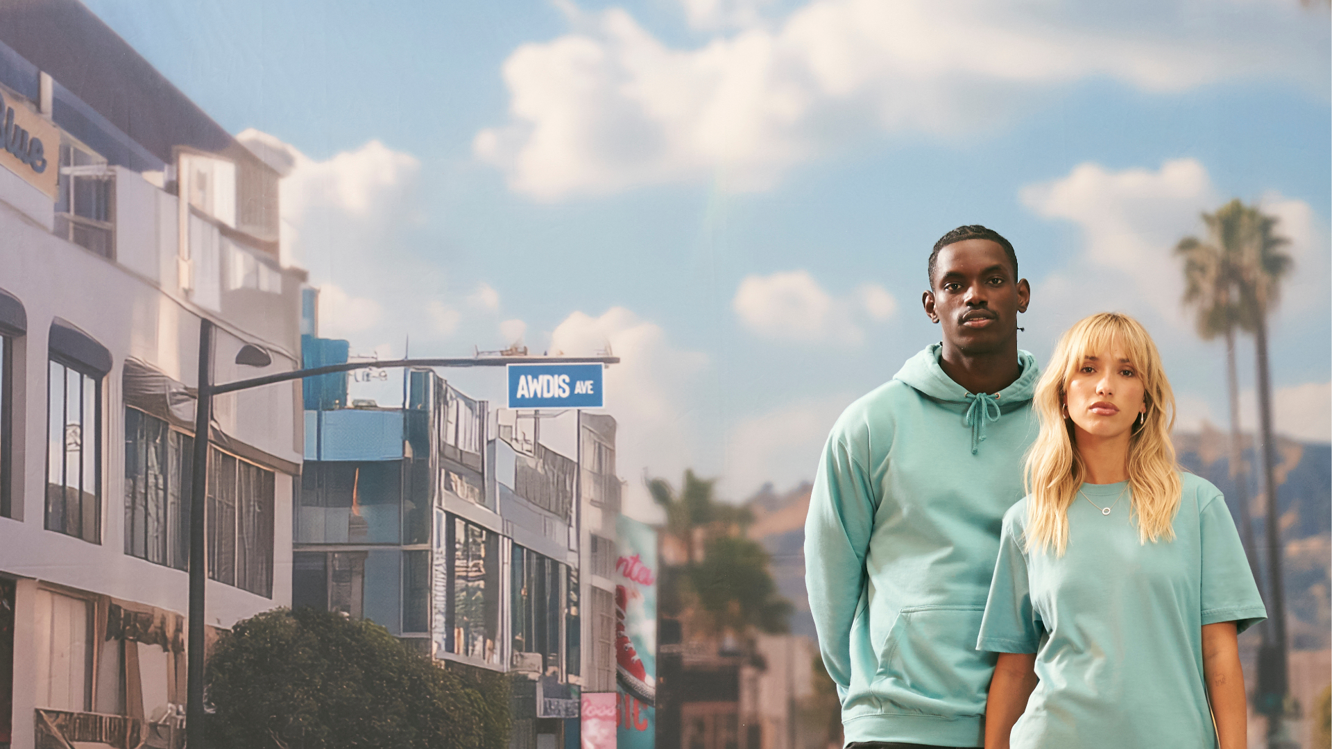 male and female model wearing hoodie and t-shirt
