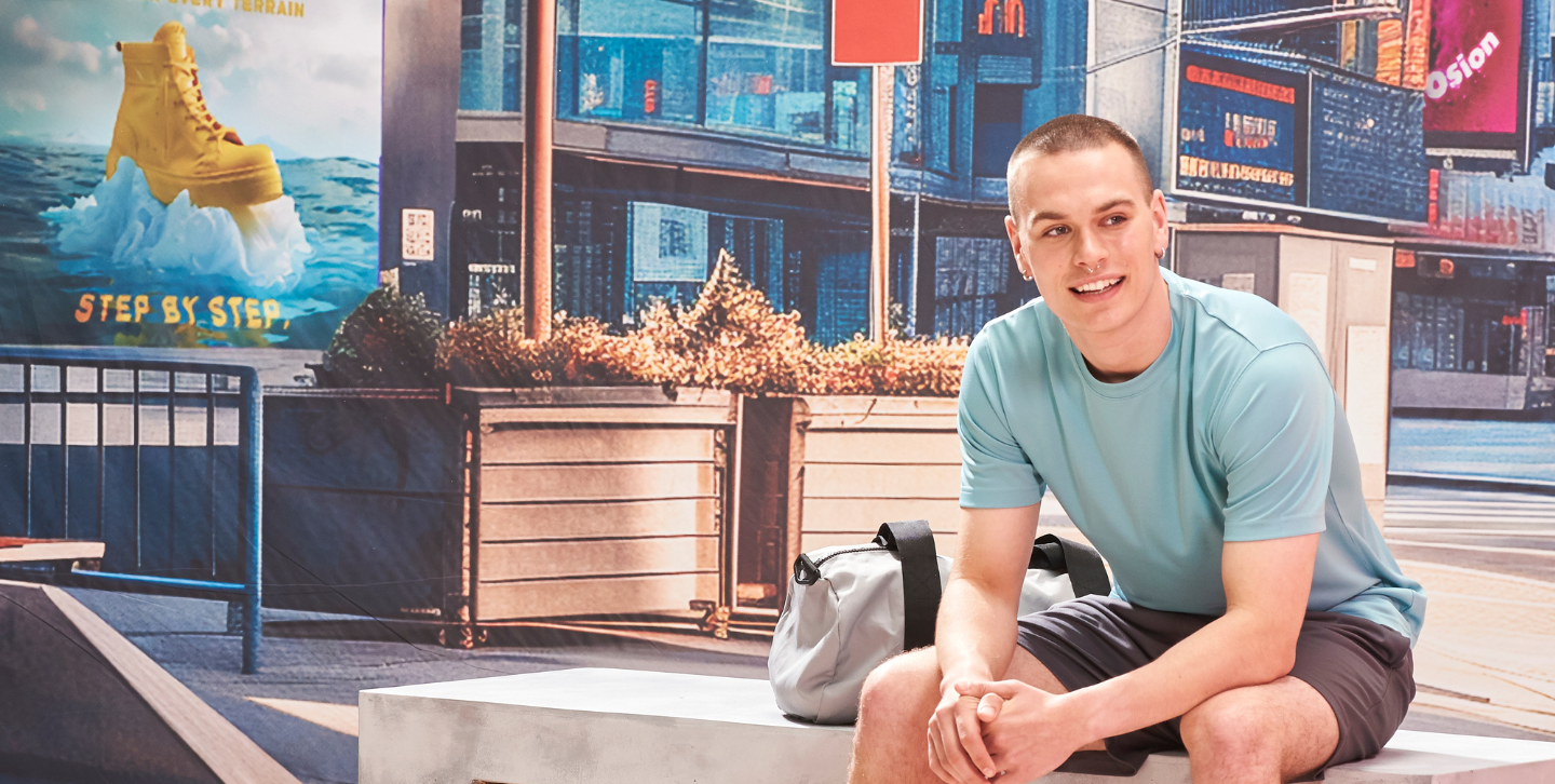 Male model sitting on bench