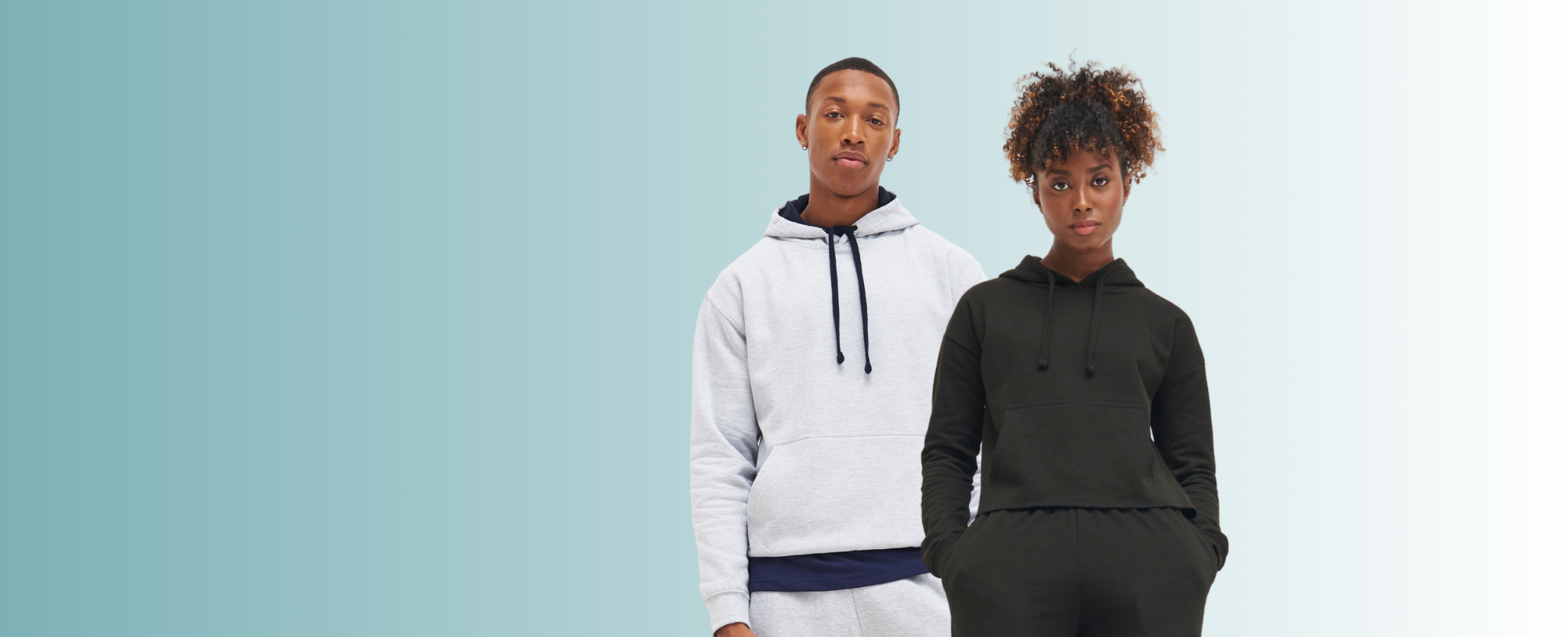 Male and female model wearing hoodies